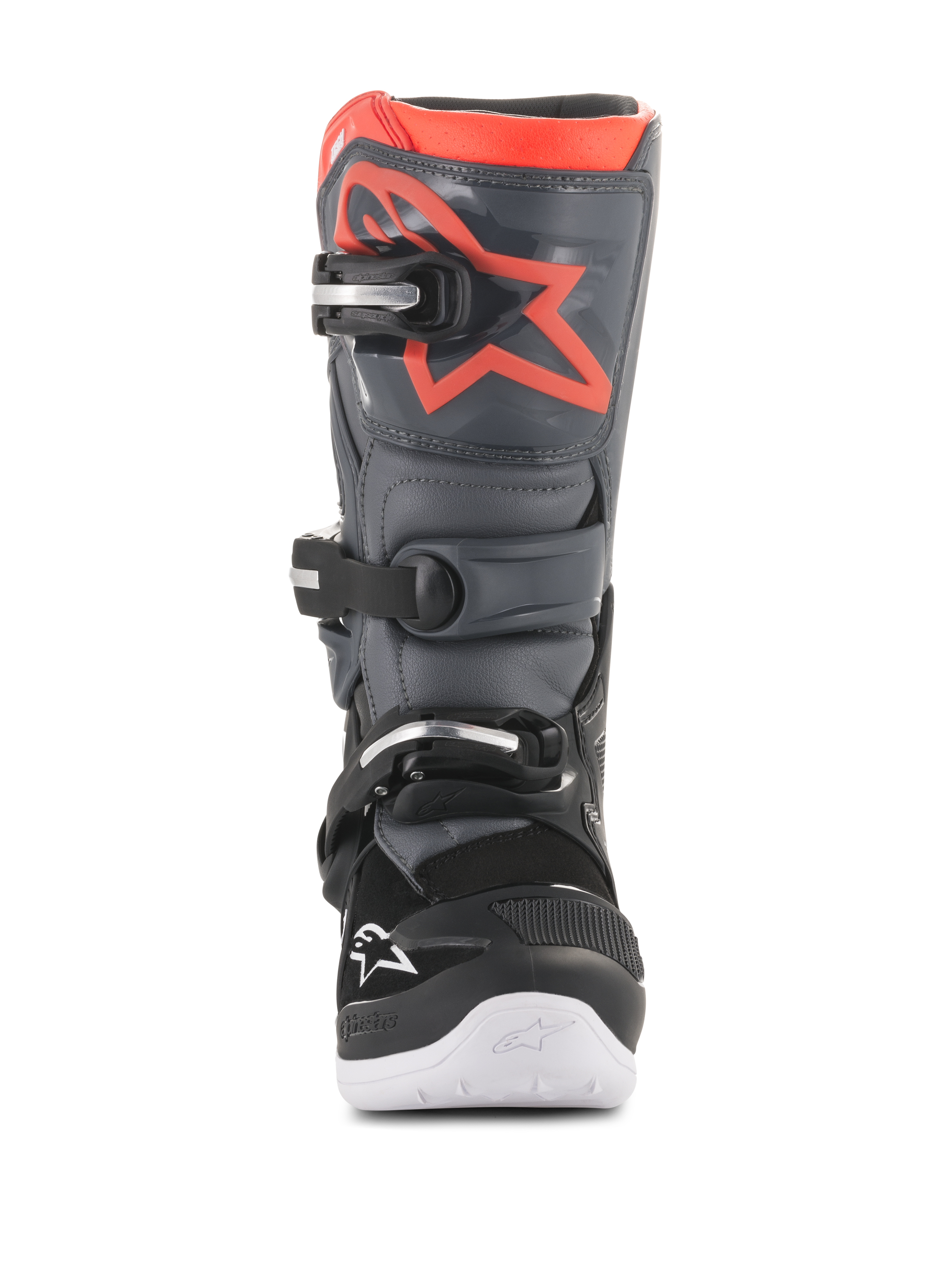 Botas Alpinestars Youth Tech 7S, botas de motocross, pretas e cinzento escuro com detalhes em vermelho fluorescente, vista frontal, com placa de canela em TPU com logótipo de estrela vermelha, sistema de fecho de três fivelas e sola integrada branca, equipamento de proteção durável para todo-o-terreno
