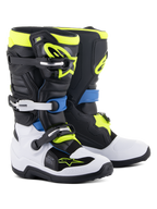 Botas Alpinestars Youth Tech 7S, botas de motocross, pretas, azul enamel, amarelo néon e brancas, com fechos de fivela de alto impacto, caneleiras em TPU e sistema de pivô flexível para desempenho off-road para jovens.