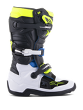 Alpinestars Youth Tech 7S, botas de motocross para jovens, pretas, brancas e amarelo néon com pormenores em azul, sistema de fivelas ajustáveis, painéis de proteção reforçados e sola de alta tração para corridas todo-o-terreno