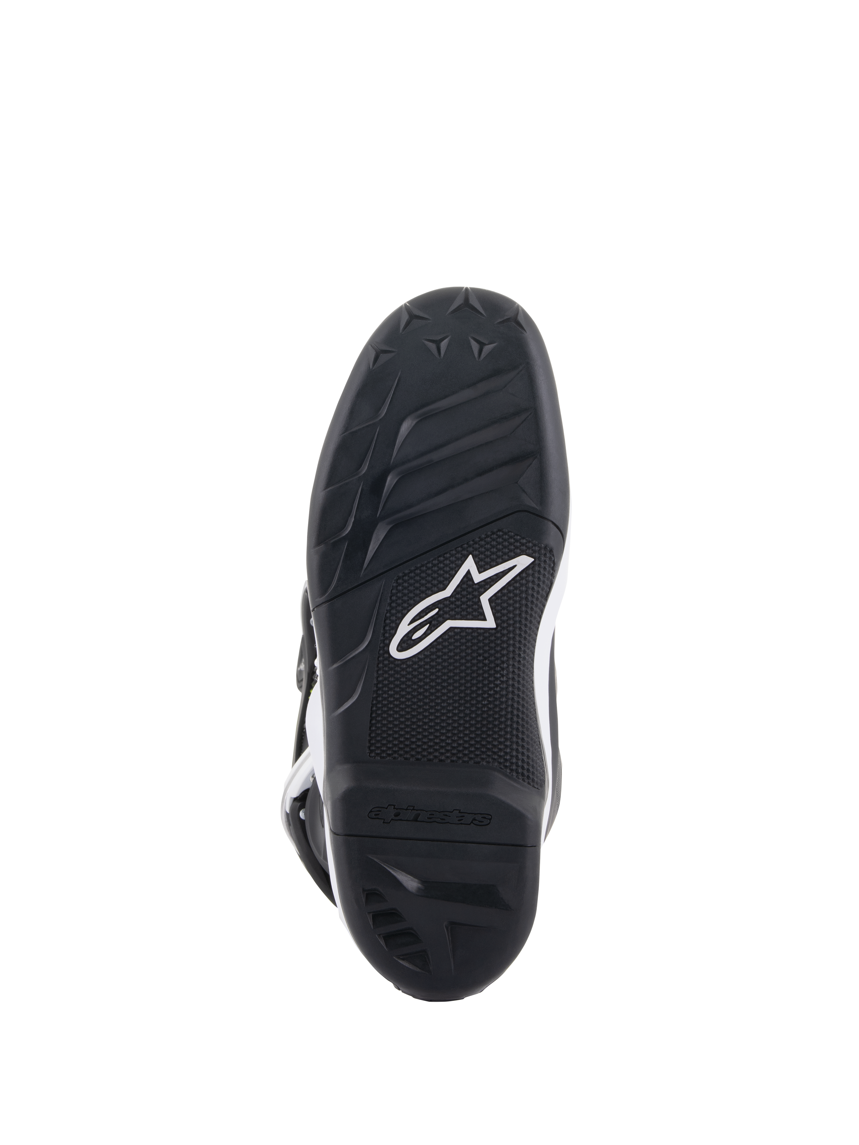Botas Alpinestars Youth Tech 7S, vista da sola inferior, borracha preta com padrão de aderência texturizado e logótipo Alpinestars branco, construção em composto durável para motocross juvenil