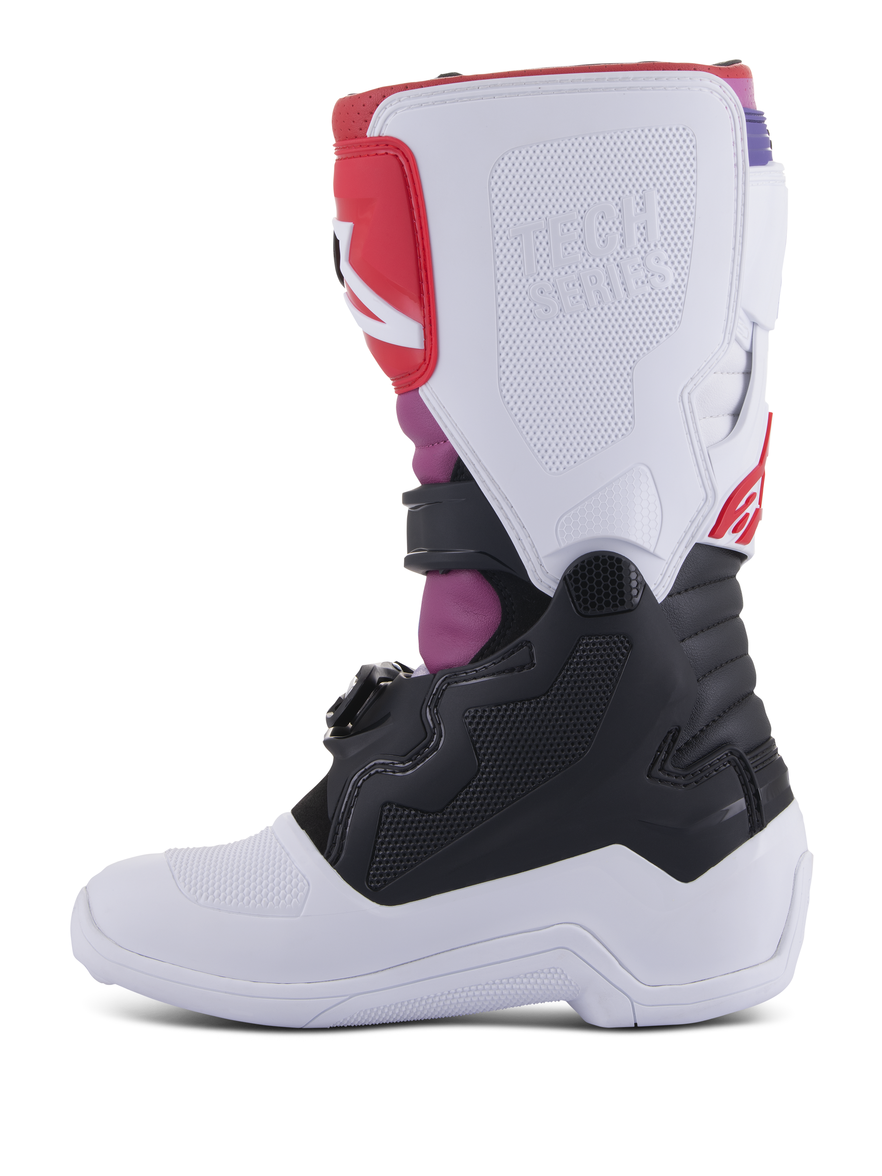 Botas Alpinestars Youth Tech 7S, botas de motocross, White Black Rainbow, vista lateral medial com placa de canela branca e logótipo Tech Series em relevo, secção inferior preta e detalhes vibrantes em rosa e vermelho, equipamento de proteção durável para condução todo-o-terreno juvenil