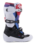 Botas Alpinestars Youth Tech 7S, botas de motocross para jovens pilotos, brancas e pretas com pormenores em vermelho, azul e roxo, sistema de fecho de fivela tripla, painéis de proteção em TPU e sola branca espessa e durável
