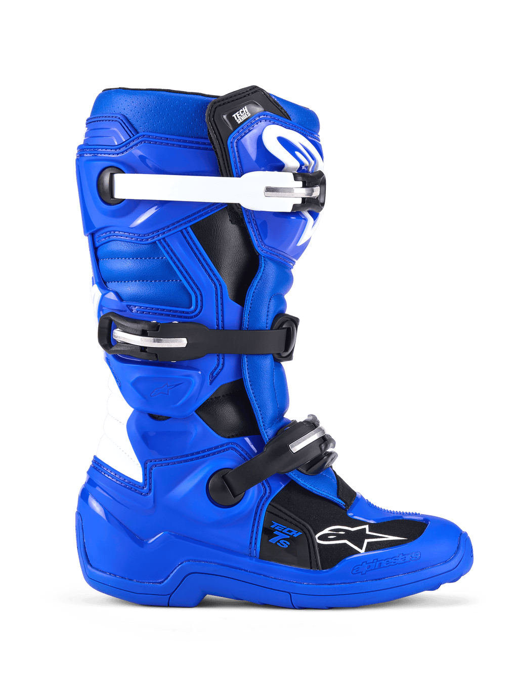 Botas Alpinestars Youth Tech 7 S, botas de motocross, azuis, pretas e brancas, vista lateral mostrando a parte superior em microfibra reforçada com PU, sistema de fecho de quatro fivelas com correias brancas e pretas, placa de canela em TPU e logótipo Alpinestars, calçado de proteção todo-o-terreno para jovens pilotos