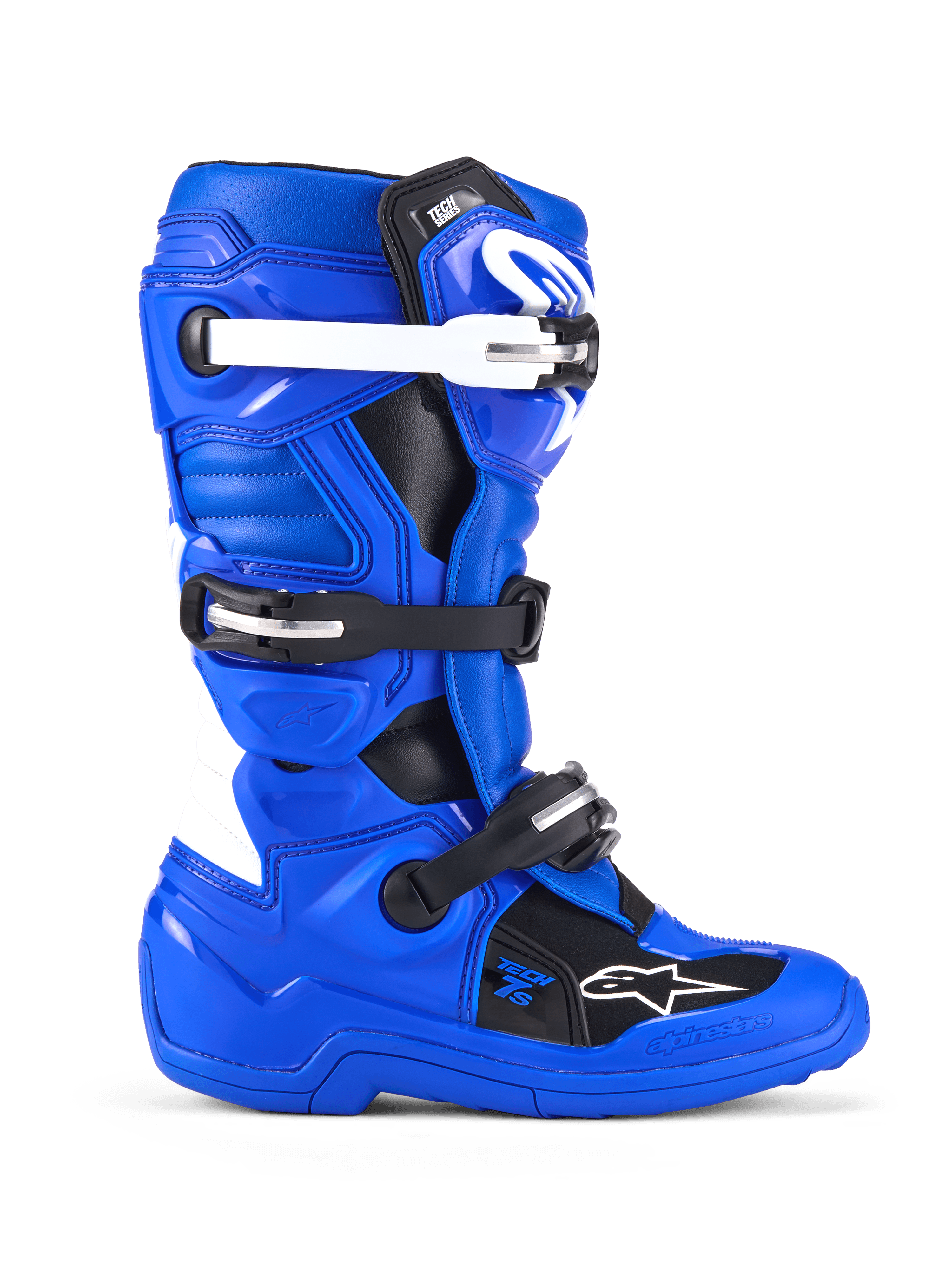 Botas Alpinestars Youth Tech 7 S, botas de motocross, azuis, pretas e brancas, vista lateral mostrando a parte superior em microfibra reforçada com PU, sistema de fecho de quatro fivelas com correias brancas e pretas, placa de canela em TPU e logótipo Alpinestars, calçado de proteção todo-o-terreno para jovens pilotos
