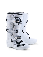 Alpinestars Tech 7S, botas de motocross para juventude, brancas e pretas, com proteção em TPU e certificadas CE.
