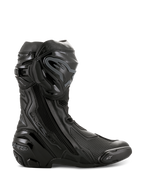 Alpinestars Supertech R Boots, botas de corrida de motociclismo de alta performance, totalmente pretas, vista de perfil lateral com protetor de canela em TPU, slider de dedos substituível e calcanhar reforçado, design profissional pronto para pista