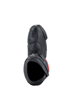 Botas Alpinestars Supertech R, botas de performance para motociclismo de competição, pretas com detalhes vermelhos, vista superior destacando a parte superior em microfibra, textura perfurada, zona do seletor em TPU e abertura de entrada segura.