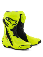 Alpinestars Supertech R Vented Boots, Racing Motorcycle Boots, Bright Yellow Fluo and Black, featuring extensive perforations for airflow, black TPU shin plate and heel protectors, and a sleek aerodynamic profile for high-performance track and road use.