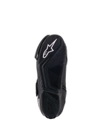 Botas Alpinestars Stella SMX-1 R V2 para Mulher, pretas, vista inferior da sola em composto de borracha com padrão de alta aderência e logótipo da estrela Alpinestars em branco, calçado de motociclismo de alta performance