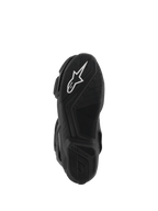 Botas Alpinestars Stella SMX-6 V3 Drystar®, vista inferior da sola de borracha preta, com logótipo da estrela Alpinestars em branco, padrões de aderência texturizados para tração e design aerodinâmico para controlo da moto.