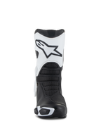 Botas Alpinestars Stella SMX-6 V3 Drystar®, botas de motociclismo femininas, brancas e pretas, vista frontal destacando a placa de canela branca com o logótipo Astars, zonas de flexão pretas texturizadas e elementos de proteção em TPU para condução de performance.