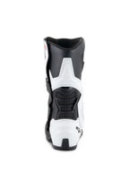 Botas Alpinestars Stella SMX-6 V3 Drystar®, botas de motociclismo para mulher, brancas e pretas, vista traseira com proteção de TPU na panturrilha e no calcanhar, painéis de malha preta flexíveis e design ergonómico derivado das corridas.