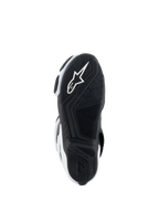 Botas Alpinestars Stella SMX-6 V3 Drystar®, botas de motociclismo para mulher, brancas e pretas, vista da sola com sola exterior de borracha preta com padrão de aderência texturizado, logótipo da estrela Alpinestars branco integrado e marca no calcanhar