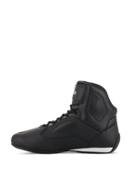Sapatos de motociclismo Alpinestars Stella Faster-3 Rideknit® para mulher, em preto, amarelo e cor-de-rosa, vista de perfil lateral, com um design de cano alto elegante, painéis perfurados e um detalhe branco no calcanhar.