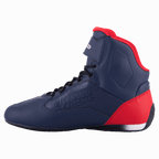 Alpinestars Austin Riding Shoe, Night Navy and Bright Red, profile view showing the navy blue microfiber upper with red heel and collar accents, black laces, 'Alpinestars Protects' embossed branding, high-top motorcycle riding footwear