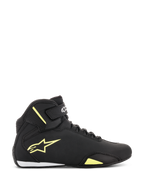 Alpinestars Sektor Shoes, Motorcycle Riding Shoes, Black and Yellow Fluorescent, side view showing yellow star logo, ankle strap with branding, and white heel accent on a sleek microfiber upper.