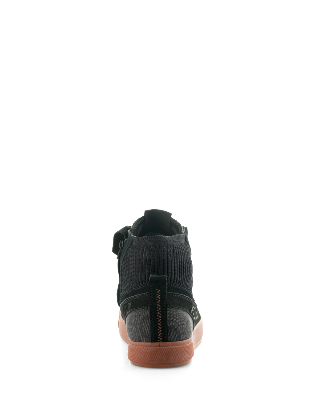 Alpinestars Stated Shoes, sapatos de motociclismo urbanos Black Gum, vista traseira destacando a sola vulcanizada cor de goma, parte superior em camurça preta e lona e colarinho do tornozelo em malha canelada