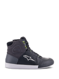 Alpinestars Chrome Drystar Shoes, urban motorcycle riding sneakers in Black, Dark Gray, and Yellow Fluo, featuring premium leather and suede panels, white sole, neon yellow laces, and signature star logo.