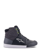 Alpinestars Chrome Drystar Shoes, urban motorcycle riding sneakers in Black, Dark Gray, and Yellow Fluo, featuring premium leather and suede panels, white sole, neon yellow laces, and signature star logo.