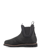 Alpinestars Turnstone Shoes, Black Chelsea-style motorcycle riding boot, side profile view, crafted from 1.5mm bovine leather with elasticated ankle panels and front and rear pull tabs.