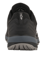 Alpinestars Meta Trail Shoes, Performance Running Shoes, Black and Dark Gray, rear view showing heel pull tab with white Astar logo, dark gray midsole, and textured outsole, casual motorsport-inspired footwear for the paddock