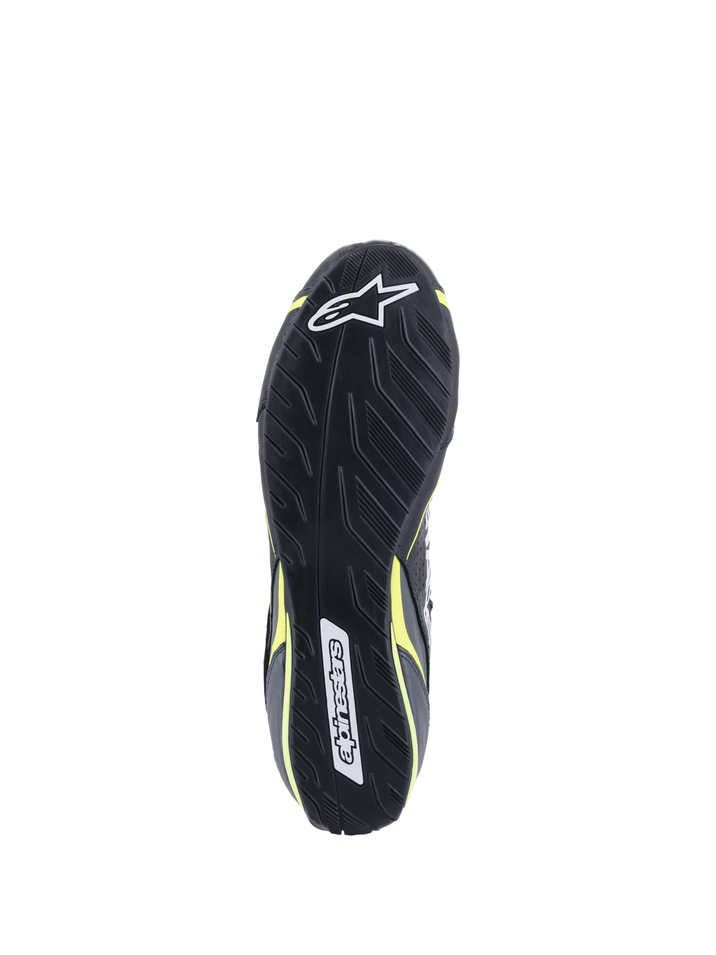 Sapatos Alpinestars Tech-1 T V3 FIA, vista da sola, pretos com detalhes em amarelo néon, sola de borracha inspirada no padrão de rasto de pneus assimétrico, com logótipos Alpinestars e padrão texturizado para sensibilidade nos pedais e aderência