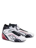Sapatos Alpinestars Tech-1 T V3 FIA, calçado para automobilismo, brancos com detalhes em preto e vermelho, com parte superior em pele de flor integral, tira de tornozelo ajustável de gancho e laço, painéis laterais perfurados com o logótipo Astars e design profissional de competição