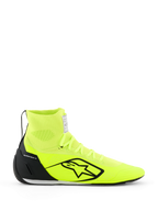 Sapatos Alpinestars Supertech K - FIA, sapatos de karting, amarelo néon e preto, vista de perfil lateral, parte superior totalmente tricotada com cano alto, contraforte de calcanhar em TPU preto, logótipo Alpinestars preto grande, calçado de corrida leve