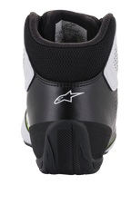 Sapatos Alpinestars Tech-1 K Start V2, sapatos de karting, branco, preto e amarelo néon, vista traseira com contraforte ergonómico do calcanhar em preto e logótipo de estrela branco, colarinho acolchoado e sola de borracha durável para performance em desportos motorizados