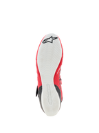 Sapatos Alpinestars Tech-1 KX V3 - FIA, sapatos de karting, vista inferior mostrando a sola exterior de borracha fina branca, padrão de aderência texturizado para sensibilidade aos pedais, rebordos superiores vermelhos, logótipo da estrela Alpinestars preto na ponta e marca em relevo no calcanhar