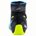 Sapatos Alpinestars Tech-1 KZ V2, sapatos de karting, preto, azul esmalte e amarelo néon, vista traseira mostrando a construção superior em malha tricotada, o logótipo Alpinestars e o suporte de calcanhar em amarelo néon vibrante