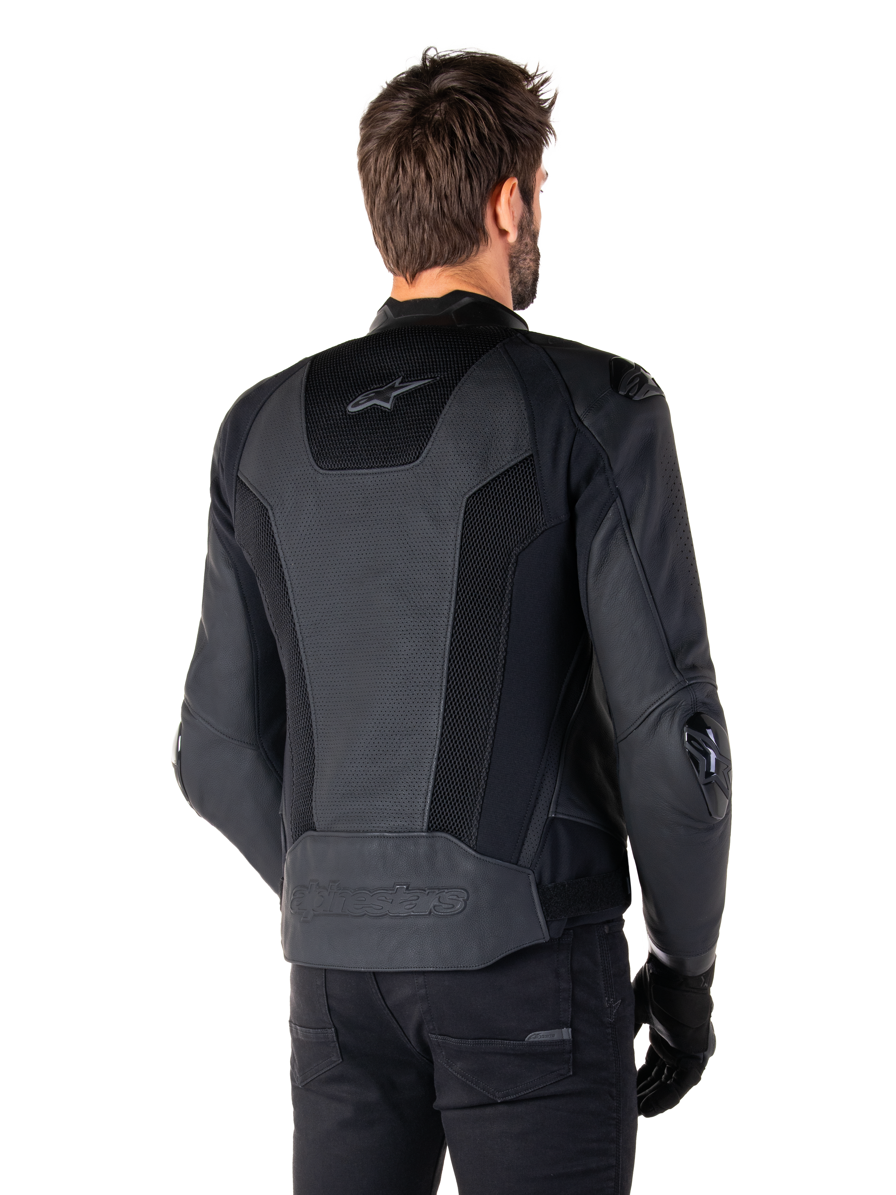 Alpinestars Missile V3 Airflow Leather Jacket, Black, Rear view on model, featuring perforated leather and mesh panels for ventilation, external TPU protectors on shoulders and elbows, sleek racing-inspired design