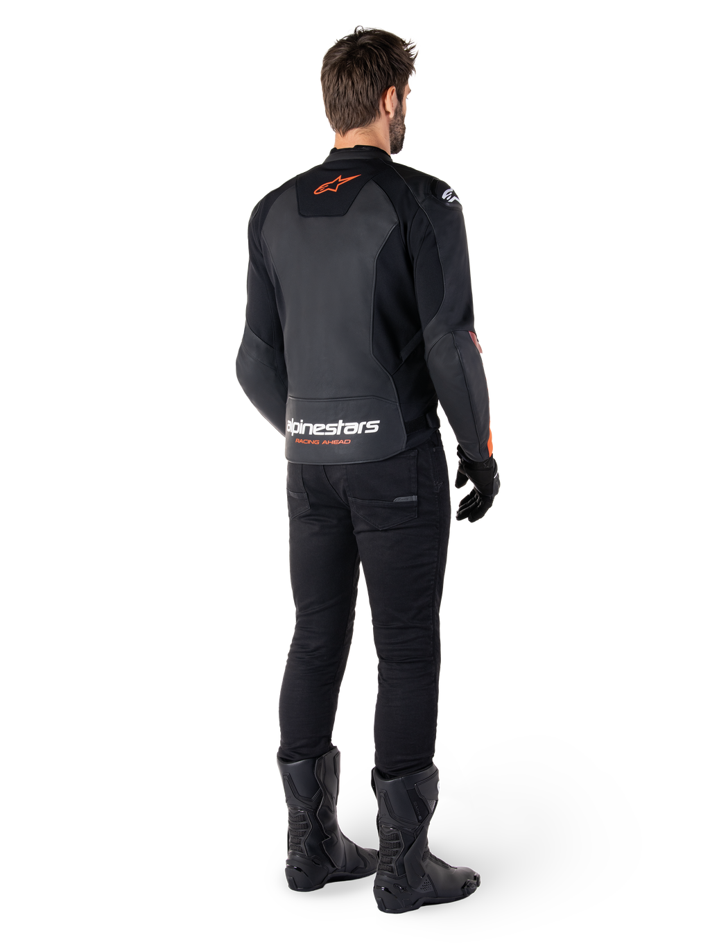 Alpinestars Faster V3 Leather Jacket, Sport Motorcycle Jacket, Black and Red Fluo, rear view worn with black pants and black boots, featuring 'alpinestars RACING AHEAD' text on the lower back and a small red star logo, sleek sport-fit leather construction