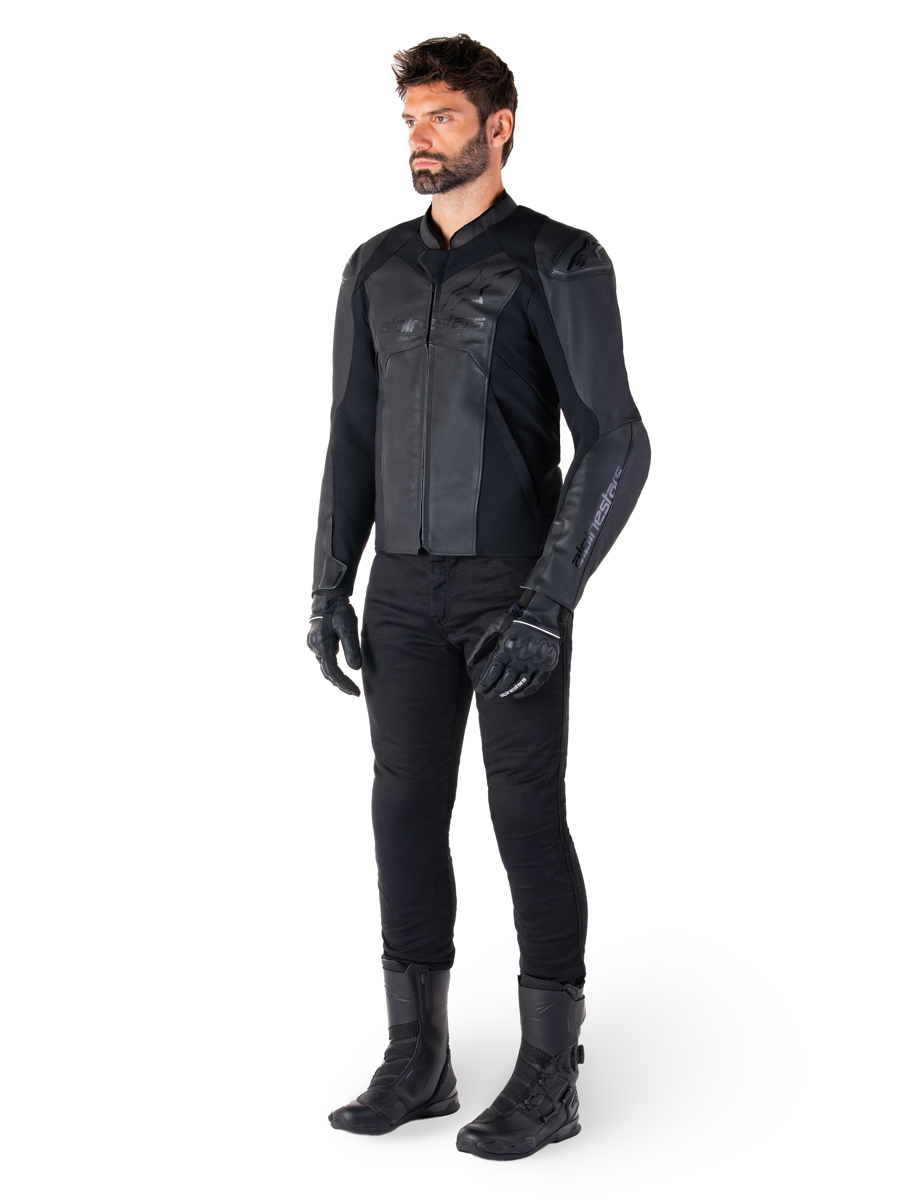 Alpinestars Faster V3 Leather Jacket, Black Black, worn with black pants, gloves, and boots, featuring a technical leather build with HRSF stretch panels, integrated DFS GP Lite shoulder protectors, and a sleek sport-derived silhouette