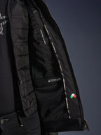 Interior view of the Alpinestars Blacktrack Leather Jacket in Black, featuring the detachable quilted thermal vest, internal waterproof compartment, and mesh lining with chest protector readiness.