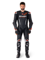 Alpinestars GP-R7 One Piece Leather Suit for men, professional motorcycle racing gear in Black and Red Fluo.