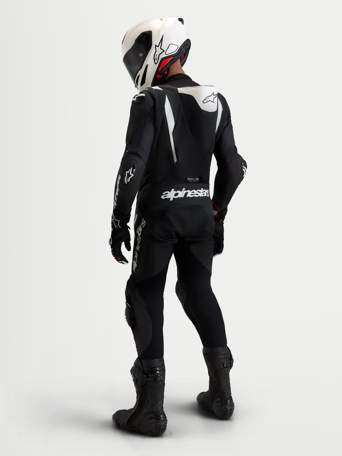 Alpinestars Missile V3 macacão de couro de 1 peça, macacão de corrida em couro para homem em preto e branco, com corcunda aerodinâmica, proteção DFS e capacete a combinar, vista traseira