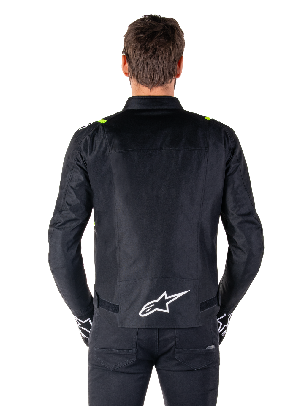 Alpinestars T-SPS V2 Waterproof Jacket, vista traseira, preto com detalhes em amarelo fluo nos ombros e logótipo de estrela branco na parte inferior das costas, casaco de motociclismo têxtil com silhueta desportiva, usado por modelo masculino