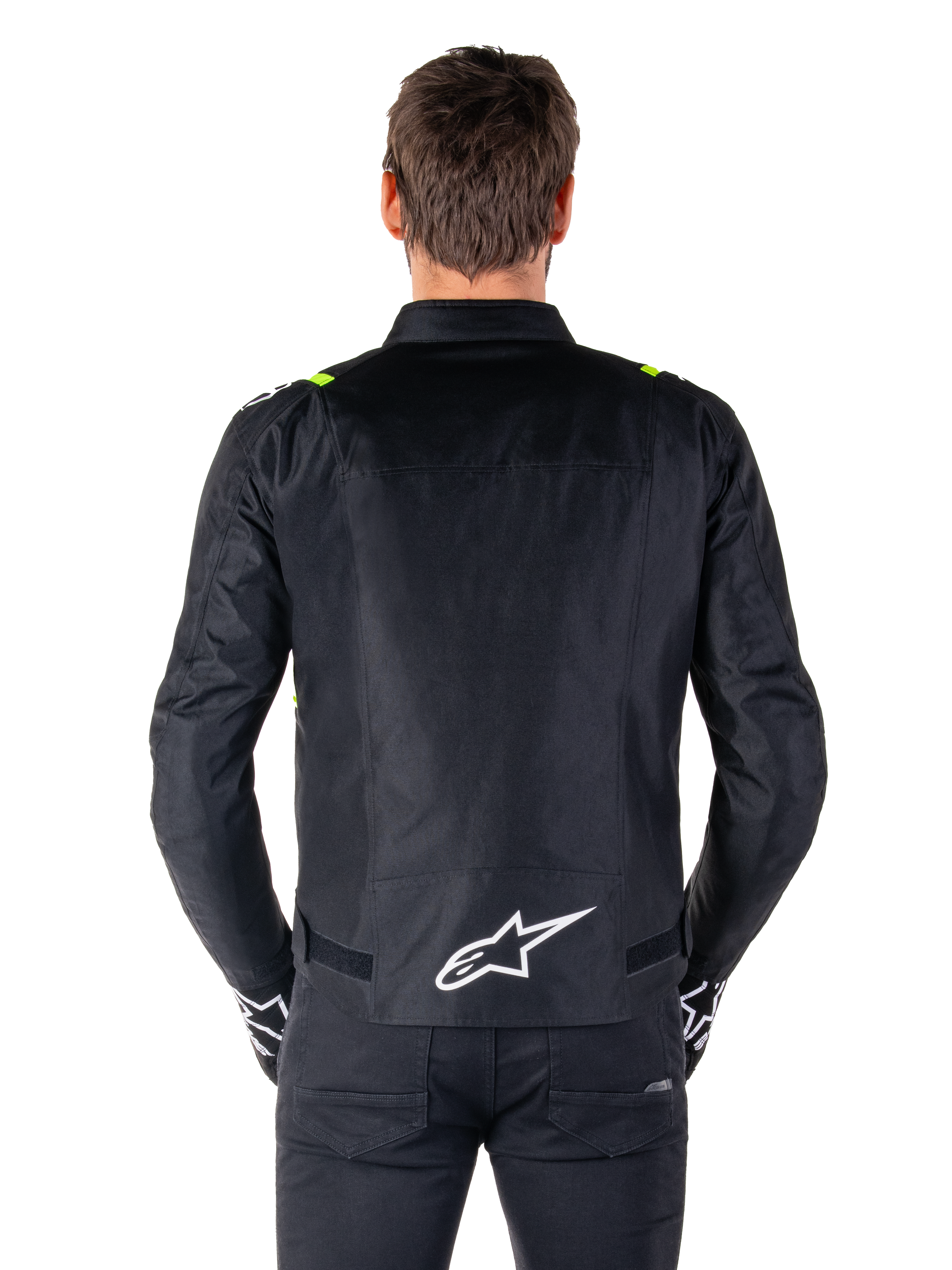 Alpinestars T-SPS V2 Waterproof Jacket, vista traseira, preto com detalhes em amarelo fluo nos ombros e logótipo de estrela branco na parte inferior das costas, casaco de motociclismo têxtil com silhueta desportiva, usado por modelo masculino