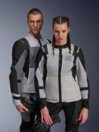 Alpinestars ST-2 Air and Stella ST-2 Air Jackets, Ice Gray and Black, textile motorcycle jackets with mesh panels and laser perforations, featuring 'Alpinestars Exploration Equipment' branding, worn by male and female models holding riding gloves.