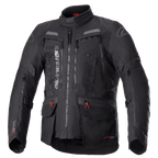Alpinestars Bogota Pro Drystar Jacket, All-Black Motorcycle Touring Jacket, Gray and Red accents, featuring large chest ventilation panels, waterproof pockets with red pull tabs, high protective collar, and durable textile construction for adventure riding.