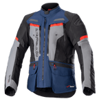 Alpinestars Bogota Pro Drystar Jacket, motorcycle adventure touring jacket, Dark Blue and Black with Gray chest panels and Bright Red accents, featuring waterproof textile construction, multiple ventilation zippers, and utility pockets.