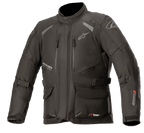 Alpinestars Andes V3 Drystar Jacket, Motorcycle Adventure Touring Jacket, Black with white and red branding, features multiple waterproof cargo pockets, adjustable straps for a custom fit, weather-resistant textile construction, reflective panels for visibility
