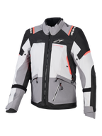 Alpinestars Stella Andes V4 Drystar®, casaco de moto para mulher, cinzento e preto, detalhes coral fluorescente, impermeável.