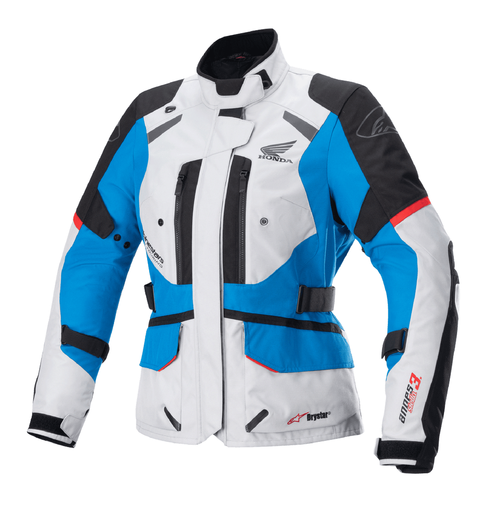 Casaco Alpinestars Stella Honda Andes V3 Drystar para mulher, casaco de motociclismo touring, cinzento ice, azul e vermelho vivo, construção têxtil impermeável com logótipo da asa da Honda, aberturas de ventilação com fecho de correr, correias de ajuste na cintura