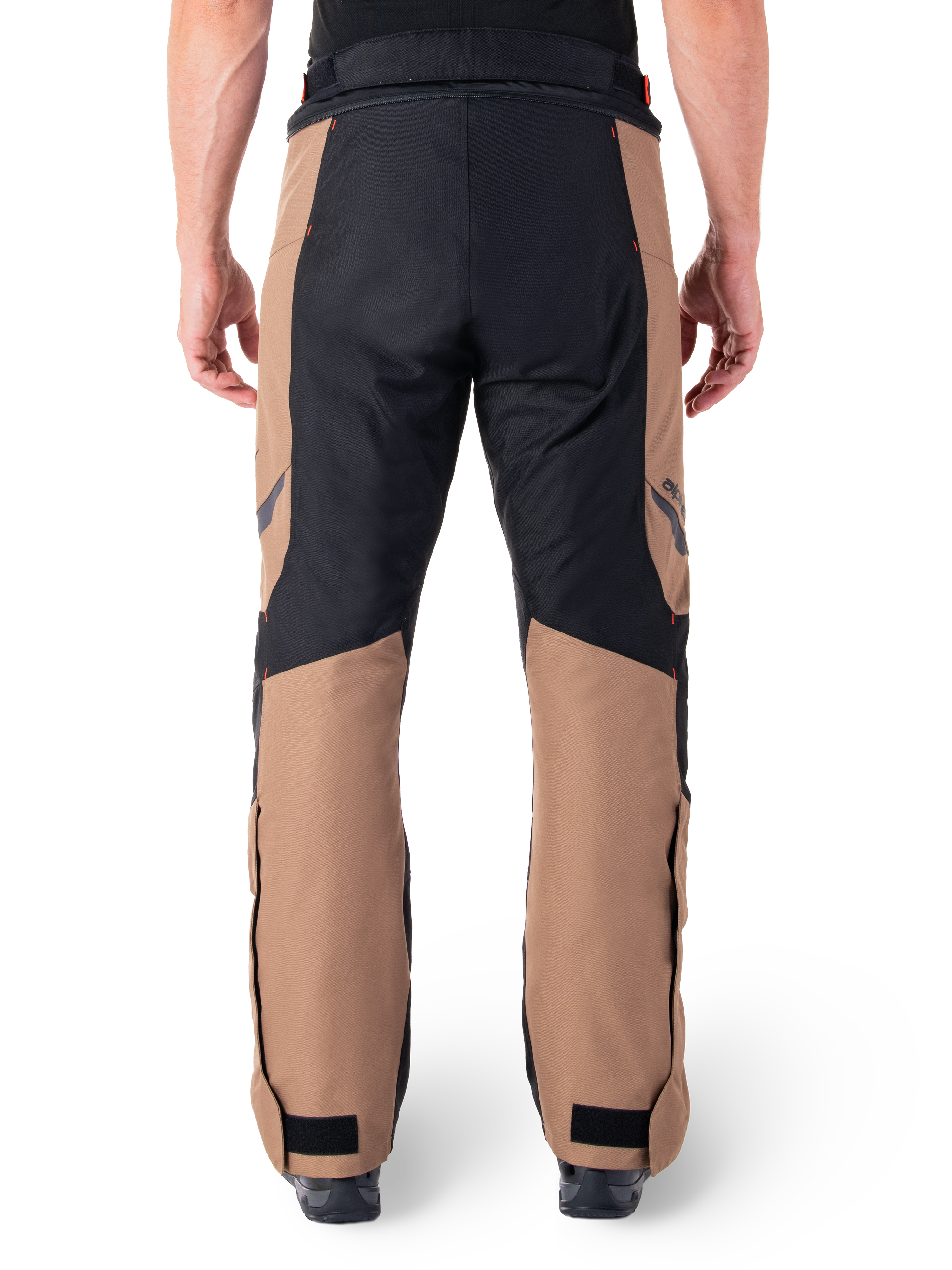 Alpinestars St-1 Waterproof Pants, Motorcycle Touring Pants, Dark Khaki Sand and Black with Red Fluo accents, rear view, featuring a durable textile construction, ergonomic panels for mobility, and adjustable hook and loop ankle closures.
