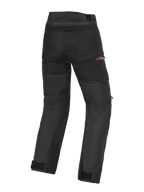Alpinestars Andes V4 Drystar® Pants, Adventure Motorcycle Pants, Black, rear view showing textile construction with reinforced seat and knee areas, red Drystar logo on the hip, adjustable waist and ankle straps, waterproof and durable design for all-weather riding