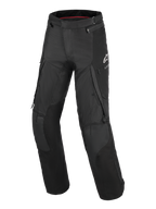 Alpinestars Andes V4 Drystar® Pants, Motorcycle Touring Pants, Black, featuring large cargo pockets, reinforced knee panels, white A-star logo on the hip, and durable textile construction for adventure riding