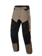 Alpinestars Cusco Drystar® Pants, calças de motociclismo de aventura Walnut Black, vista frontal, com painéis castanho nogueira e pretos com detalhes laranja, ampla ventilação com fecho nas coxas e construção têxtil durável.