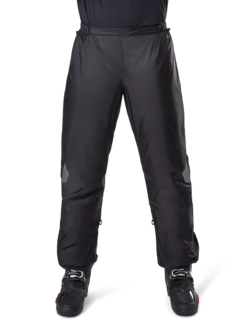 Alpinestars Bogota Pro Drystar 3 Seasons Pants, Waterproof Motorcycle Pants, Black, lightweight technical fabric with reflective knee patches, worn as over-pants with black riding boots, designed for adventure touring weather protection